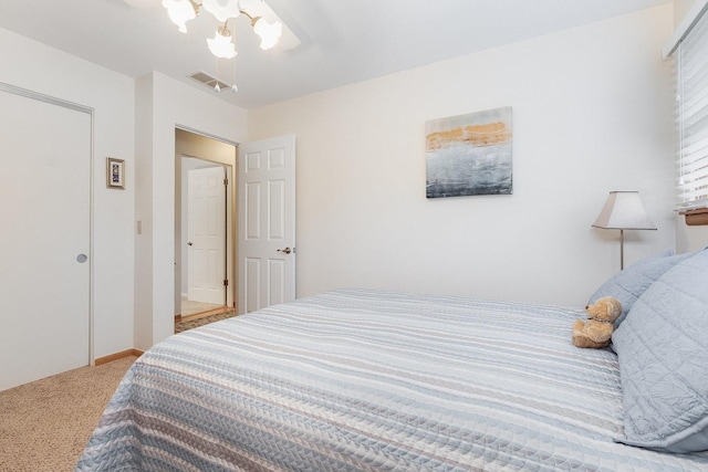 bedroom with ceiling fan and carpet