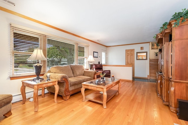 living room featuring crown molding, baseboard heating, and light hardwood / wood-style floors