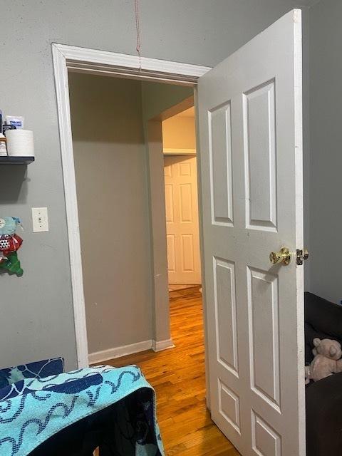 bedroom featuring hardwood / wood-style floors