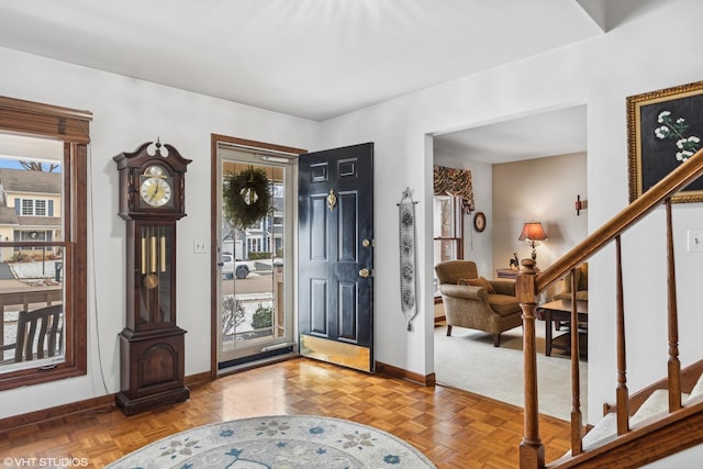 foyer featuring light parquet flooring