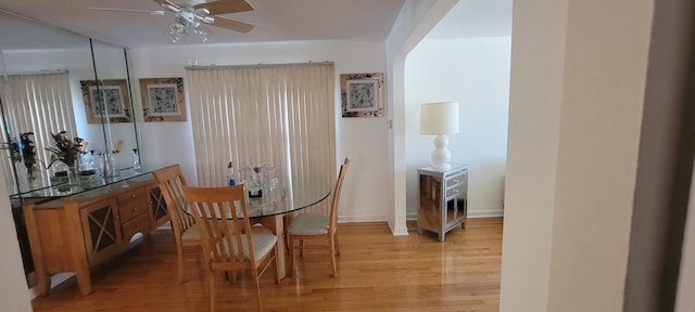 dining area featuring ceiling fan and light hardwood / wood-style flooring