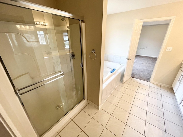 bathroom with tile patterned flooring and plus walk in shower