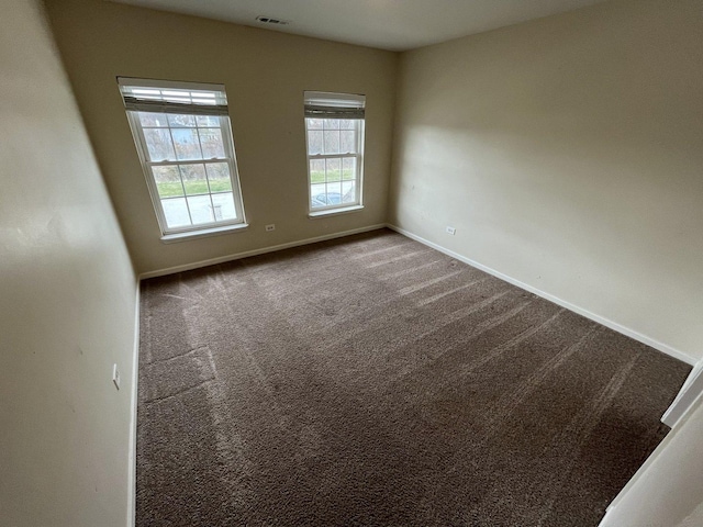 view of carpeted spare room