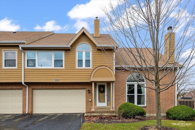 view of front of home featuring a garage