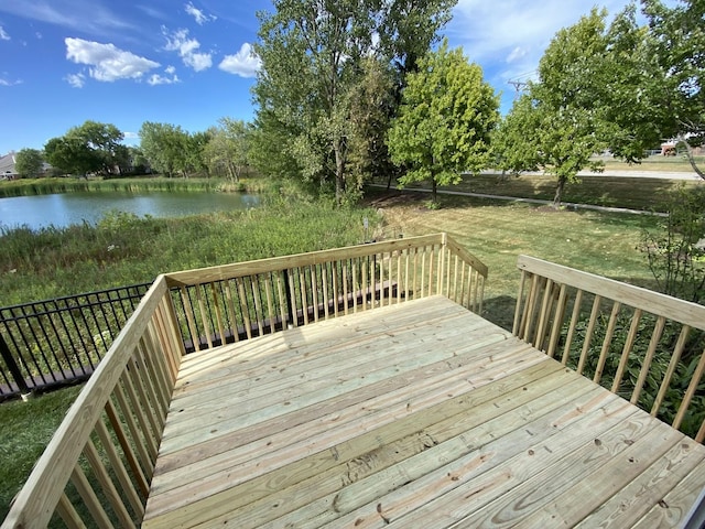 wooden terrace with a water view