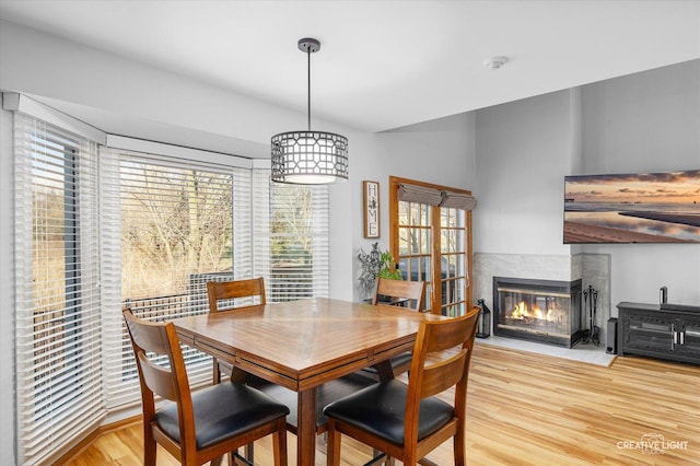 dining area featuring light wood-type flooring