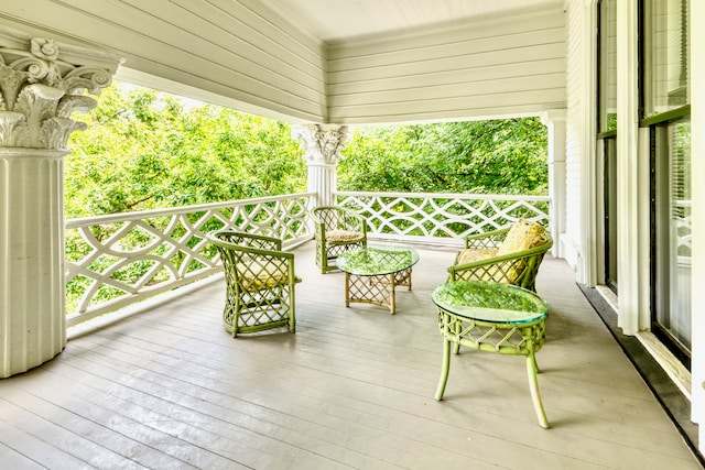 wooden deck featuring a porch