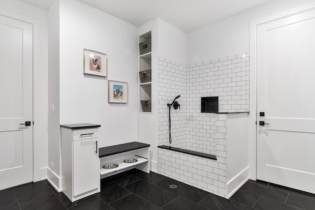 interior space with dark tile patterned flooring