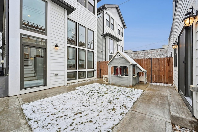 view of snow covered patio