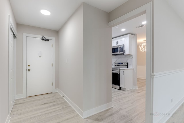 entryway with light wood-type flooring