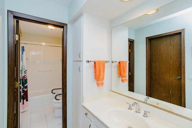 full bathroom featuring vanity, tile patterned floors, shower / bath combo with shower curtain, and toilet