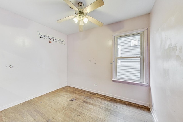 spare room with ceiling fan and light hardwood / wood-style floors