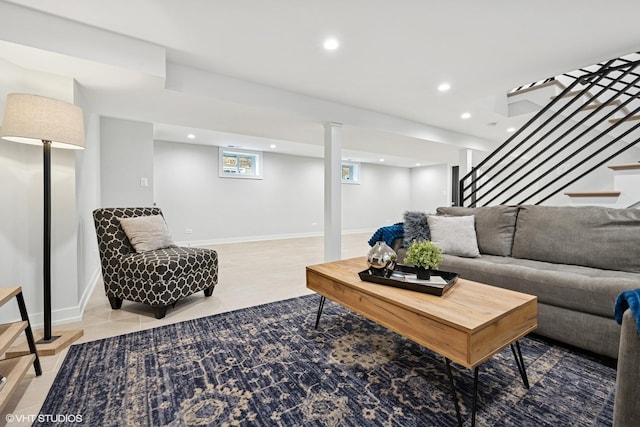 living area with recessed lighting, light tile patterned flooring, stairway, and baseboards