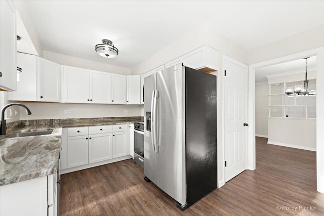 kitchen with white cabinetry, sink, stainless steel appliances, and dark hardwood / wood-style floors