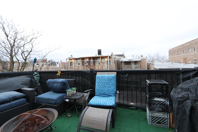 exterior space featuring a balcony and grilling area