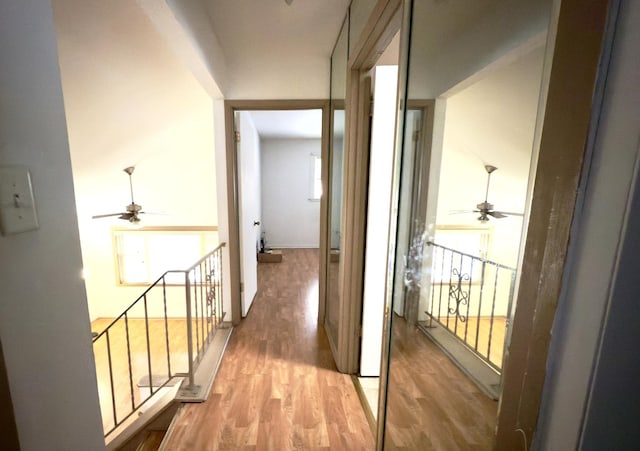 hallway with wood-type flooring