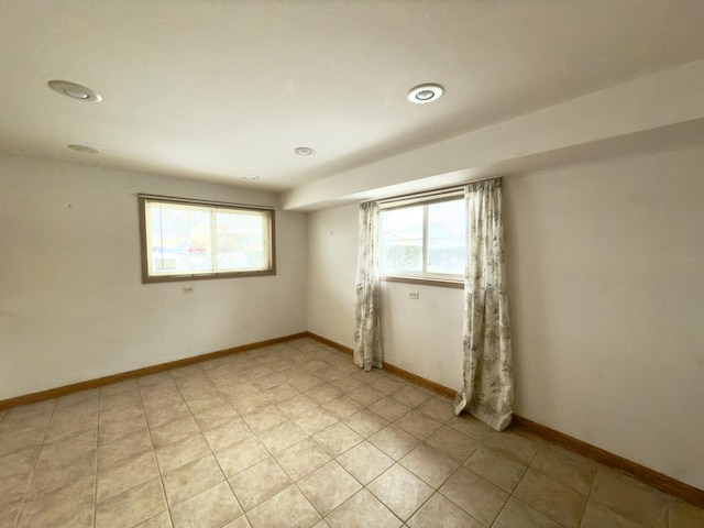 unfurnished room with plenty of natural light