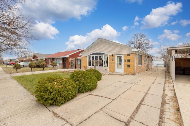 view of front of property with an outbuilding and a garage