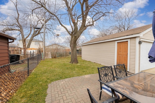 view of yard featuring a patio area and an outdoor structure