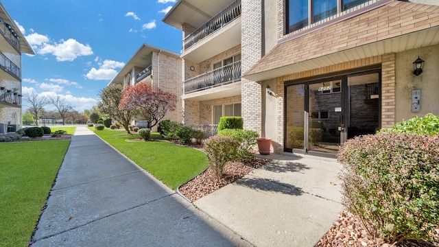 exterior space with a lawn