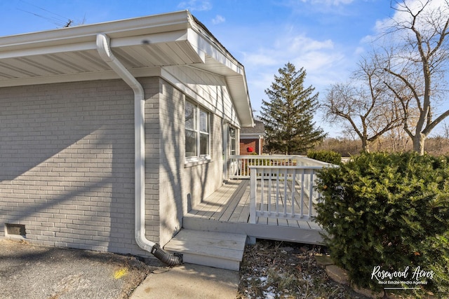 view of side of property featuring a deck