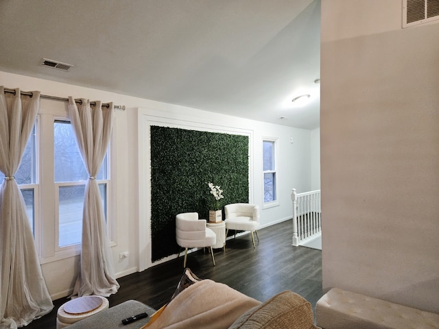 living room with dark hardwood / wood-style floors