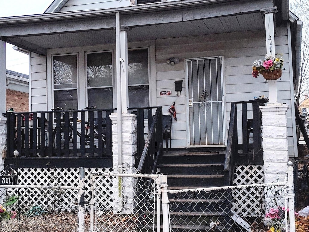 entrance to property with covered porch