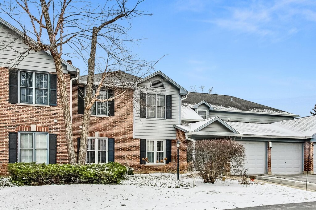 front of property with a garage