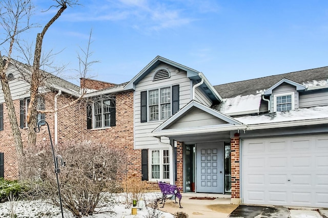 view of front of property featuring a garage