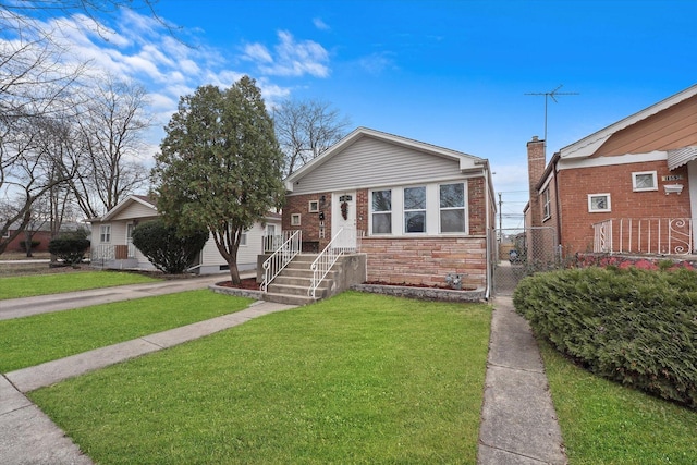 bungalow-style house featuring a front yard