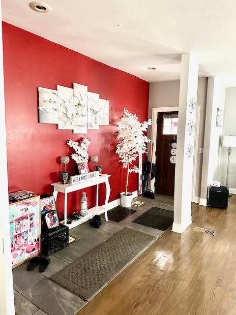 mudroom with hardwood / wood-style floors