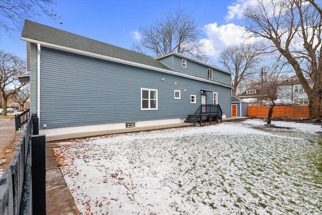 8601 S Houston Ave, Chicago, IL 60617 - snow covered property with a storage shed