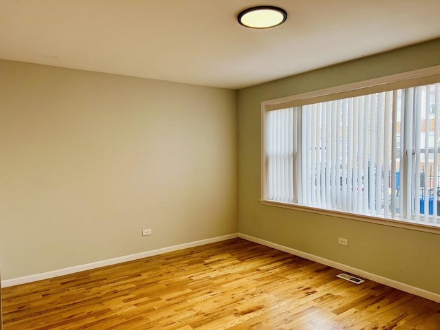 empty room featuring light hardwood / wood-style floors