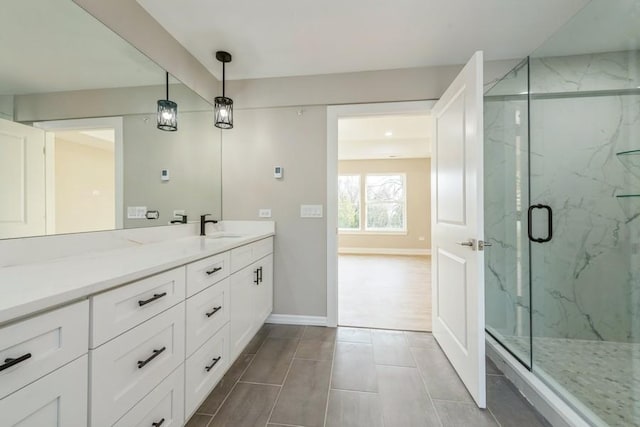 bathroom with vanity and walk in shower