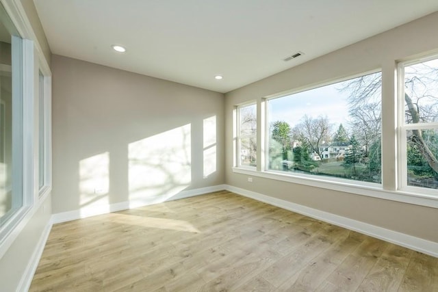 unfurnished sunroom with a healthy amount of sunlight