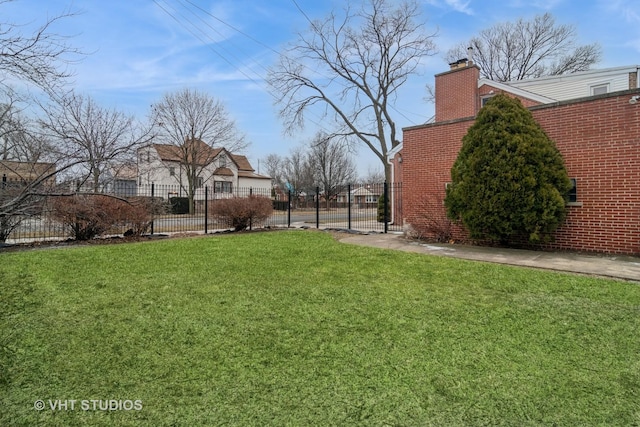 view of yard with fence