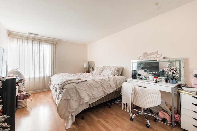 bedroom featuring light hardwood / wood-style floors