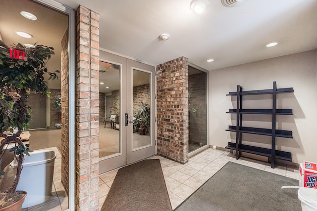 interior space with french doors and tile patterned floors