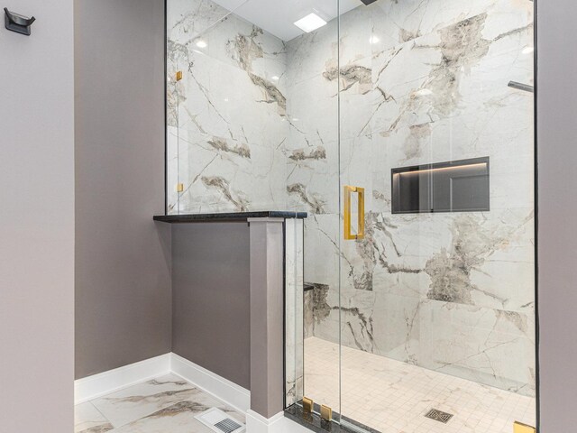 bathroom with an enclosed shower