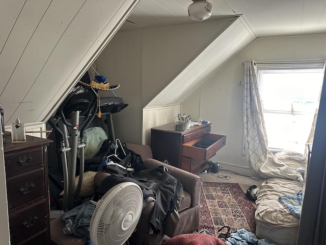 bonus room with carpet floors and vaulted ceiling