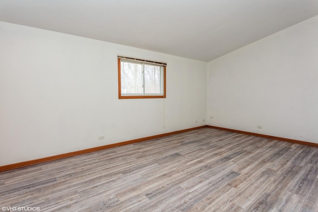 unfurnished room featuring light wood-type flooring