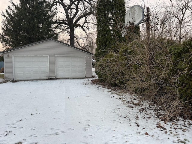 view of snow covered garage