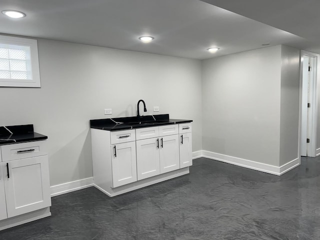 kitchen with white cabinets and sink