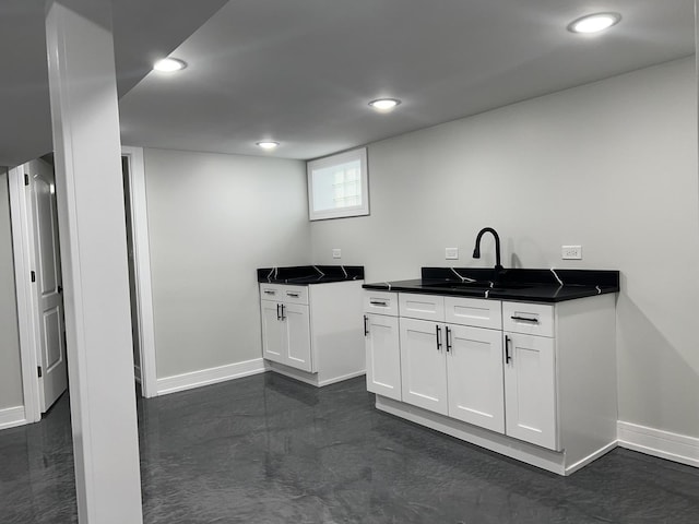 kitchen with sink and white cabinets