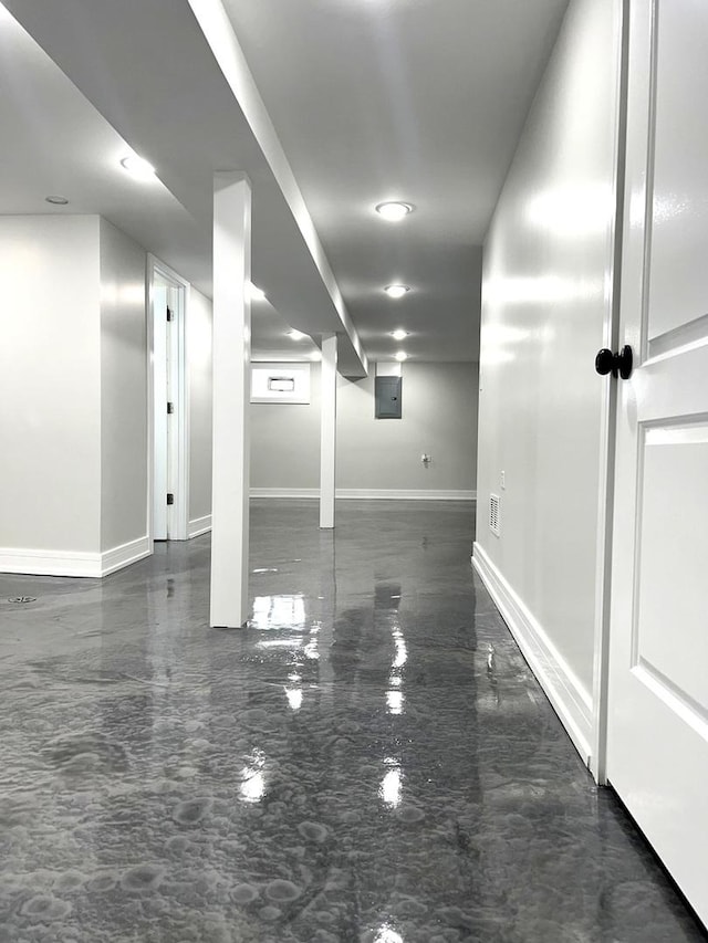 interior space with marble finish floor and baseboards