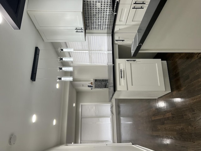 kitchen featuring white cabinetry