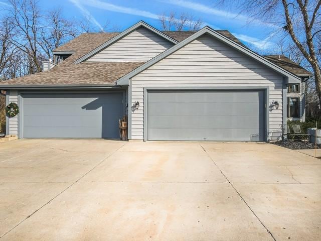 single story home with a garage