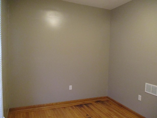 unfurnished room featuring light hardwood / wood-style flooring