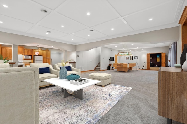 living room featuring light colored carpet and ornamental molding