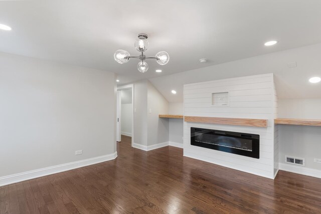 unfurnished living room with dark hardwood / wood-style flooring